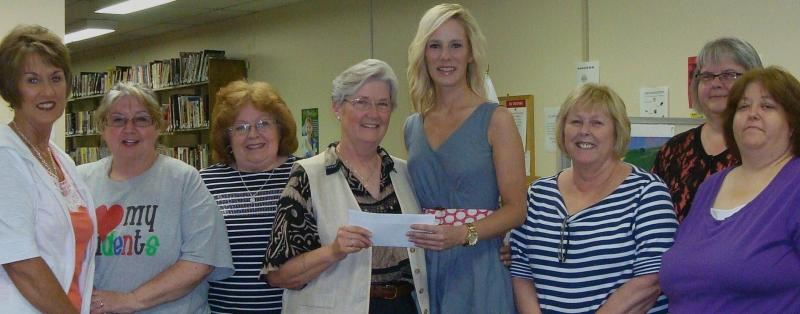 Check presentation by Livermore Woman's Club to the MDA